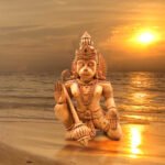 lord hanuman statue besides sea shore